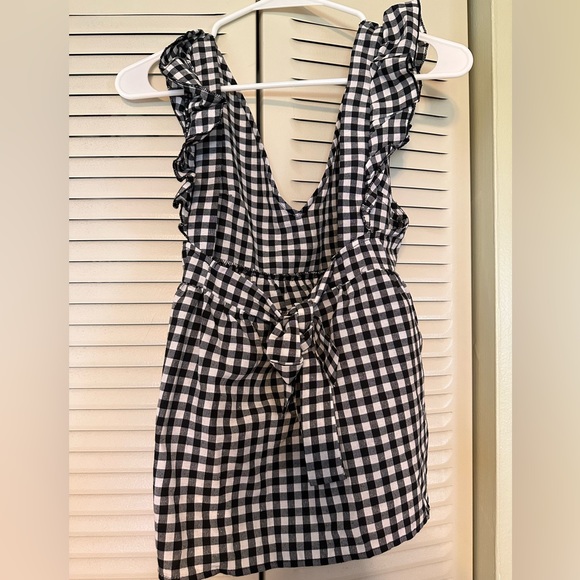 Runs large - Picture 2 of 2